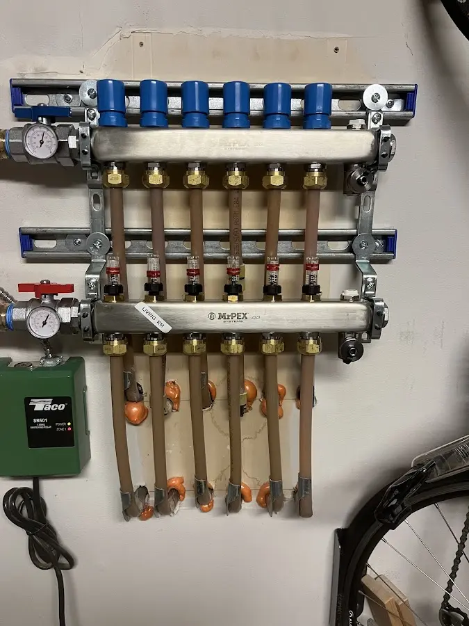 Plumber performing Water Heater Repair at a residential property in Halfmoon